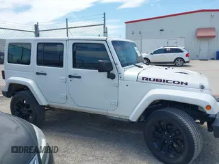 2015 Jeep Wrangler Unlimited Rubicon z VIN 1C4BJWFG1FL544883, wystawiony jako IAAI lot #42838891 z przebiegiem 87 801 mil mil oraz . Historia ofert i sprzedaży dostępna na DreamBid. Obrazek 13.