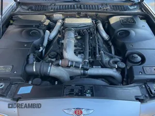 1999 Bentley Arnage with VIN SCBLB51E9XCX01954, listed as a Copart auction lot 46446125 with 81,913 mi miles and Clean Title. Bid and sale history available at DreamBid. Image 7.