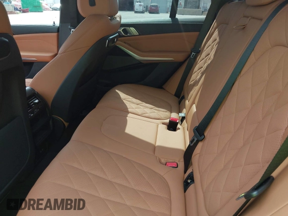 2025 BMW X5 xDrive40i with VIN 5UX23EU08S9Z12797, listed as a IAAI auction lot 42781495 with 7,393 mi miles and . Bid and sale history available at DreamBid. Image 8.