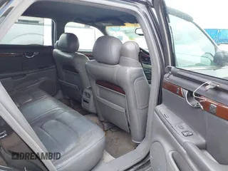 2001 Cadillac DeVille DHS z VIN 1G6KE57YX1U190955, wystawiony jako IAAI lot #41941668 z przebiegiem 191 040 mil mil oraz . Historia ofert i sprzedaży dostępna na DreamBid. Obrazek 8.