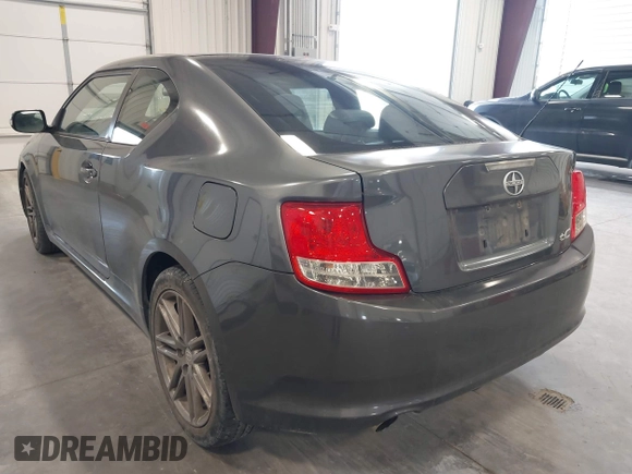 2011 Scion tC z VIN JTKJF5C79B3008777, wystawiony jako IAAI lot #41872563 z przebiegiem 149 715 mil mil oraz . Historia ofert i sprzedaży dostępna na DreamBid. Obrazek 3.