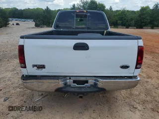 2000 Ford F-150 XL with VIN 1FTRX17L4YNB99870, listed as a Copart auction lot 60287985 with Not provided miles and Salvage title. Bid and sale history available at DreamBid. Image 6.