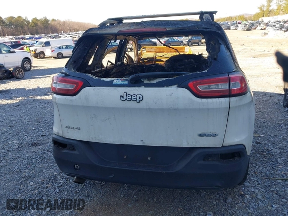 2014 Jeep Cherokee Altitude with VIN 1C4PJMCB5EW120946, listed as a IAAI auction lot 41348100 with Not Provided miles and . Bid and sale history available at DreamBid. Image 15.