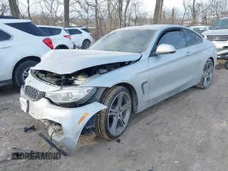 2015 BMW 4 Series 428i xDrive with VIN WBA3N9C53FK247985, listed as a IAAI auction lot 41395534 with 76,856 mi miles and . Bid and sale history available at DreamBid. Image 6.