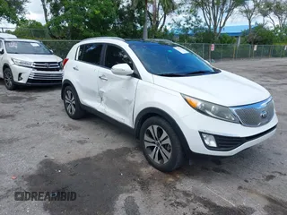 2013 Kia Sportage EX with VIN KNDPC3A21D7528487, listed as a IAAI auction lot 42556813 with 144,823 mi miles and . Bid and sale history available at DreamBid. Image 1.