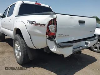 2014 Toyota Tacoma PreRunner z VIN 3TMJU4GN1EM159700, wystawiony jako IAAI lot #42460264 z przebiegiem 93 891 mil mil oraz . Historia ofert i sprzedaży dostępna na DreamBid. Obrazek 6.