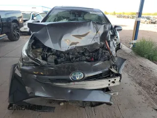 2016 Toyota Prius Four z VIN JTDKARFU0G3516517, wystawiony jako Copart lot #54998275 z przebiegiem Nie podano mil oraz Szkoda całkowita • Salvage title. Historia ofert i sprzedaży dostępna na DreamBid. Obrazek 5.