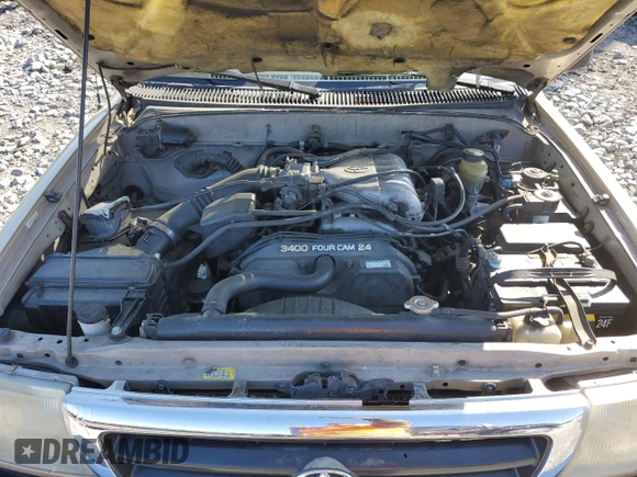 1999 Toyota Tacoma z VIN 4TAWN72N5XZ418522, wystawiony jako Copart lot #51940615 z przebiegiem 340 432 mil mil oraz Szkoda całkowita • Salvage title. Historia ofert i sprzedaży dostępna na DreamBid. Obrazek 11.