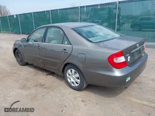 2004 Toyota Camry LE with VIN 4T1BE32K04U853924, listed as a IAAI auction lot 42114407 with 246,272 mi miles. Bid and sale history available at carsss.com. Image 3.