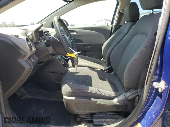 2014 Chevrolet Sonic LT with VIN 1G1JC6SB6E4120665, listed as a Copart auction lot 52042055 with 132,940 mi miles and Clean Title. Bid and sale history available at carsss.com. Image 7.