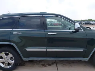 2011 Jeep Grand Cherokee Overland with VIN 1J4RR6GG4BC564913, listed as a IAAI auction lot 41910250 with 58,936 mi miles and . Bid and sale history available at DreamBid. Image 14.