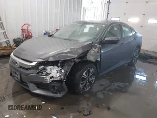 2018 Honda Civic EX-T with VIN JHMFC1F35JX031132, listed as a IAAI auction lot 41591028 with 111,087 mi miles and . Bid and sale history available at DreamBid. Image 2.
