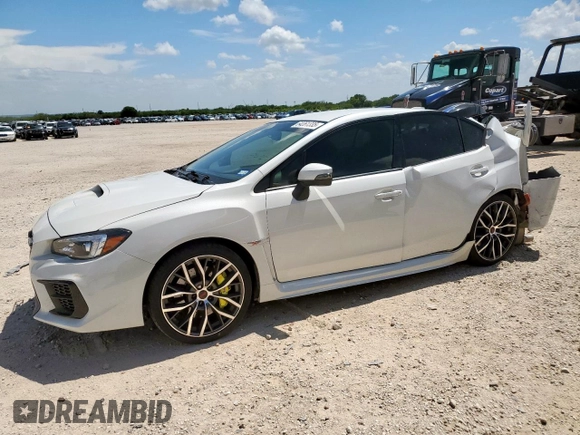2020 Subaru WRX STI with VIN JF1VA2S69L9812385, listed as a Copart auction lot 64261335 with 17,997 mi miles and Salvage title. Bid and sale history available at DreamBid. Image 1.