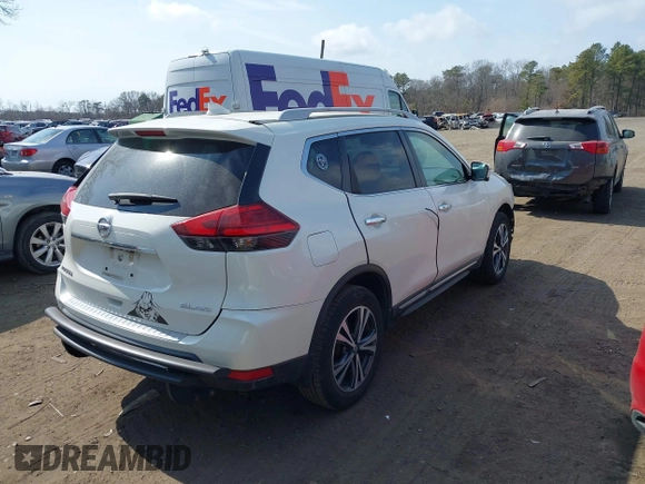 2017 Nissan Rogue SV with VIN 5N1AT2MV5HC873598, listed as a IAAI auction lot 41718074 with 63,467 mi miles. Bid and sale history available at carsss.com. Image 4.