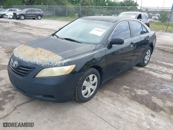 2007 Toyota Camry CE with VIN 4T1BE46K27U513940, listed as a IAAI auction lot 42108691 with 331,435 mi miles. Bid and sale history available at carsss.com. Image 2.