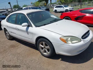 2000 Ford Taurus SES with VIN 1FAFP55U0YA264104, listed as a IAAI auction lot 42006518 with 245,838 mi miles. Bid and sale history available at carsss.com. Image 1.