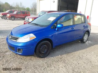 2012 Nissan Versa S with VIN 3N1BC1CP2CK284357, listed as a IAAI auction lot 41911223 with 164,806 mi miles. Bid and sale history available at carsss.com. Image 2.