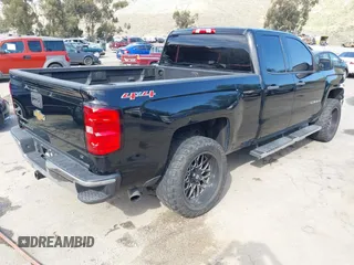 2014 Chevrolet Silverado 1500 LT with VIN 1GCVKREC7EZ417660, listed as a IAAI auction lot 41993599 with 137,025 mi miles and . Bid and sale history available at DreamBid. Image 4.