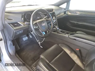 2014 Cadillac ELR z VIN 1G6RR1E48EU602033, wystawiony jako Copart lot #79508964 z przebiegiem 69 411 mil mil oraz Tytuł czysty. Historia ofert i sprzedaży dostępna na DreamBid. Obrazek 8.