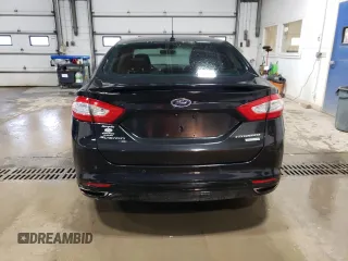 2014 Ford Fusion Titanium с VIN 3FA6P0K98ER304398, выставлен на аукционе Copart как лот 61048165 с пробегом 160 077 миль миль и Чистый • Clean title. История ставок и продаж доступна на DreamBid. Изображение 6.