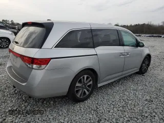 2014 Honda Odyssey Touring with VIN 5FNRL5H90EB096137, listed as a Copart auction lot 47192275 with 164,620 mi miles and Salvage Title. Bid and sale history available at DreamBid. Image 3.