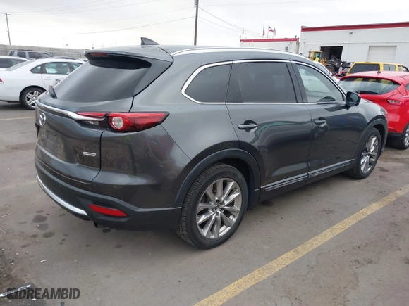2016 Mazda CX-9 Signature with VIN JM3TCBEY9G0118547, listed as a IAAI auction lot 41500960 with 183,962 mi miles. Bid and sale history available at carsss.com. Image 4.