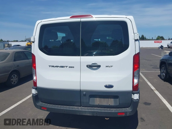 2021 Ford Transit Passenger XL with VIN 1FBAX2Y81MKA64794, listed as a IAAI auction lot 42227781 with 133,000 mi miles and . Bid and sale history available at DreamBid. Image 16.