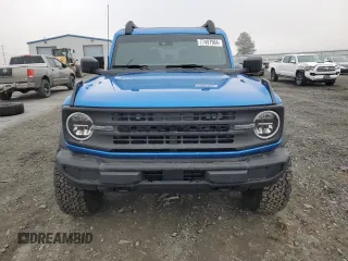 2023 Ford Bronco with VIN 1FMDE5AHXPLB26651, listed as a Copart auction lot 77497964 with 19,700 mi miles and Salvage Title. Bid and sale history available at carsss.com. Image 5.