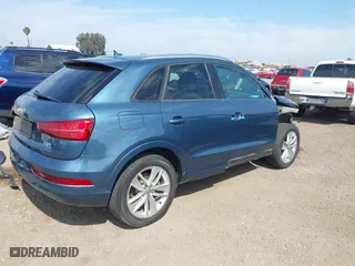 2017 Audi Q3 Premium with VIN WA1ECCFS6HR000870, listed as a IAAI auction lot 42028017 with 103,930 mi miles. Bid and sale history available at carsss.com. Image 4.