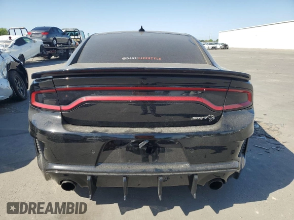 2020 Dodge Charger SRT Hellcat z VIN 2C3CDXL90LH243946, wystawiony jako Copart lot #53099975 z przebiegiem 9 297 mil mil oraz Szkoda całkowita • Salvage title. Historia ofert i sprzedaży dostępna na DreamBid. Obrazek 6.