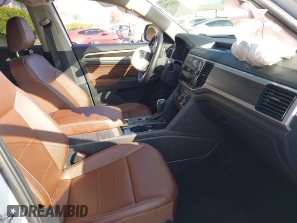 2023 Volkswagen Atlas SE z VIN 1V2WP2CA6PC533984, wystawiony jako IAAI lot #41021512 z przebiegiem 26 993 mil mil oraz . Historia ofert i sprzedaży dostępna na DreamBid. Obrazek 5.