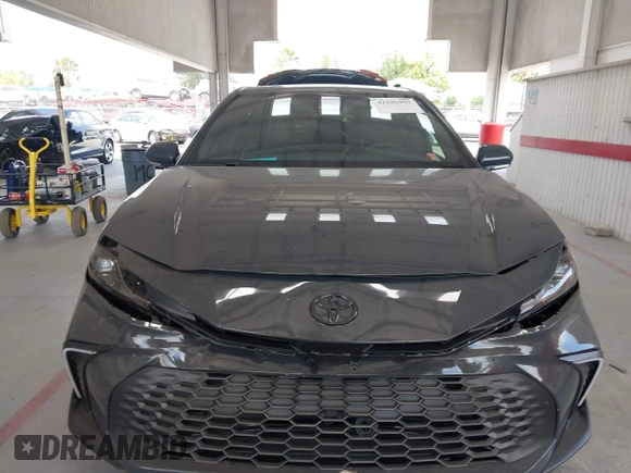 2025 Toyota Camry LE z VIN 4T1DAACK6SU057540, wystawiony jako IAAI lot #42186493 z przebiegiem 2 762 mil mil oraz . Historia ofert i sprzedaży dostępna na DreamBid. Obrazek 13.