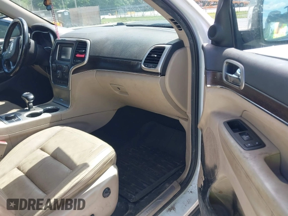 2014 Jeep Grand Cherokee Limited with VIN 1C4RJFBG5EC132159, listed as a IAAI auction lot 42604916 with 248,954 mi miles and . Bid and sale history available at DreamBid. Image 5.