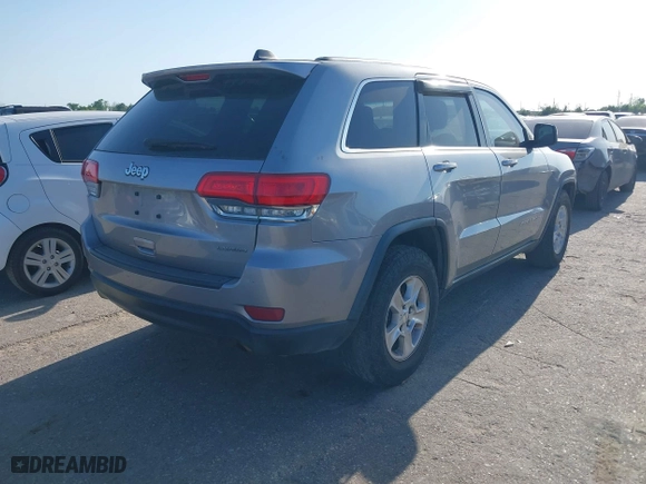 2014 Jeep Grand Cherokee Laredo with VIN 1C4RJEAG7EC547642, listed as a IAAI auction lot 42000432 with 178,996 mi miles. Bid and sale history available at carsss.com. Image 4.