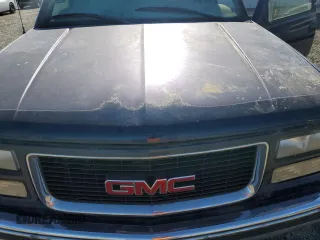 1999 GMC Yukon with VIN 1GKEK13R3XJ757466, listed as a Copart auction lot 75750884 with 270,768 mi miles and Salvage Title. Bid and sale history available at carsss.com. Image 12.