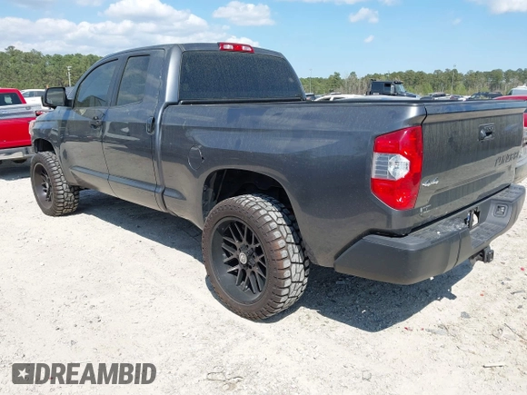 2014 Toyota Tundra 4WD Truck SR with VIN 5TFUM5F11EX055025, listed as a IAAI auction lot 41883017 with 100,565 mi miles. Bid and sale history available at carsss.com. Image 3.