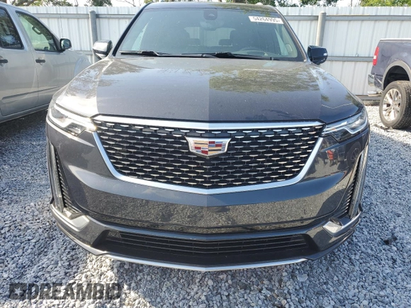2021 Cadillac XT6 Premium Luxury with VIN 1GYKPCRS1MZ199288, listed as a Copart auction lot 54264995 with 51,432 mi miles and Salvage Title. Bid and sale history available at carsss.com. Image 5.