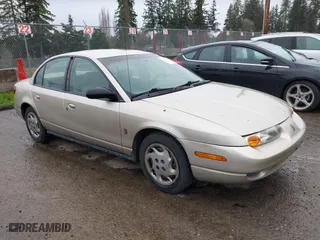 2002 Saturn SL with VIN 1G8ZK52732Z274875, listed as a IAAI auction lot 41911548 with 266,181 mi miles. Bid and sale history available at carsss.com. Image 1.