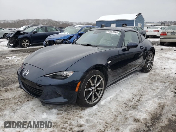 2021 Mazda MX-5 Miata Grand Touring with VIN JM1NDAM77M0454582, listed as a Copart auction lot 44959535 with 44,438 mi miles and Salvage title. Bid and sale history available at DreamBid. Image 1.