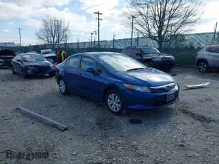 2012 Honda Civic Sdn LX with VIN 2HGFB2F55CH538021, listed as a IAAI auction lot 41912600 with 166,750 mi miles. Bid and sale history available at carsss.com. Image 1.