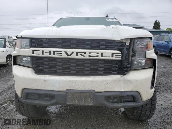2019 Chevrolet Silverado 1500 Custom with VIN 3GCPYBEH7KG227329, listed as a Copart auction lot 50712934 with 99,428 mi miles and Salvage Title. Bid and sale history available at DreamBid. Image 5.