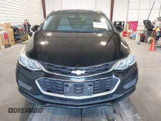 2017 Chevrolet Cruze LS z VIN 1G1BC5SM4H7270275, wystawiony jako IAAI lot #42484111 z przebiegiem 90 589 mil mil oraz . Historia ofert i sprzedaży dostępna na DreamBid. Obrazek 12.