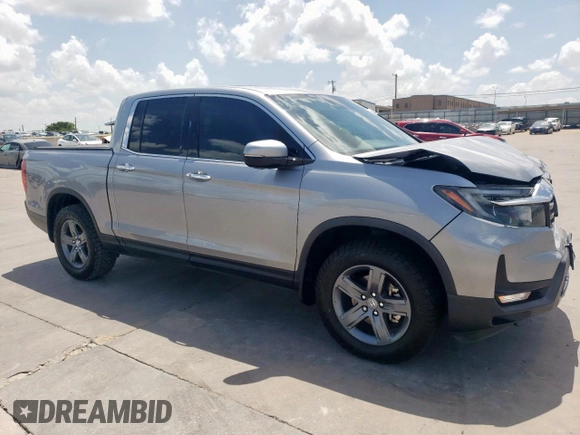 2021 Honda Ridgeline RTL-E with VIN 5FPYK3F73MB008806, listed as a Copart auction lot 62234825 with 84,716 mi miles and Salvage title. Bid and sale history available at DreamBid. Image 4.