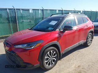 2023 Toyota Corolla Cross Hybrid S with VIN 7MUFBABG6PV008234, listed as a IAAI auction lot 41813661 with 1,127 mi miles and . Bid and sale history available at DreamBid. Image 2.
