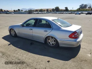 2003 Mercedes-Benz E-Class 3.2L with VIN WDBUF65JX3A096821, listed as a Copart auction lot 74378684 with 157,088 mi miles and Clean Title. Bid and sale history available at carsss.com. Image 2.