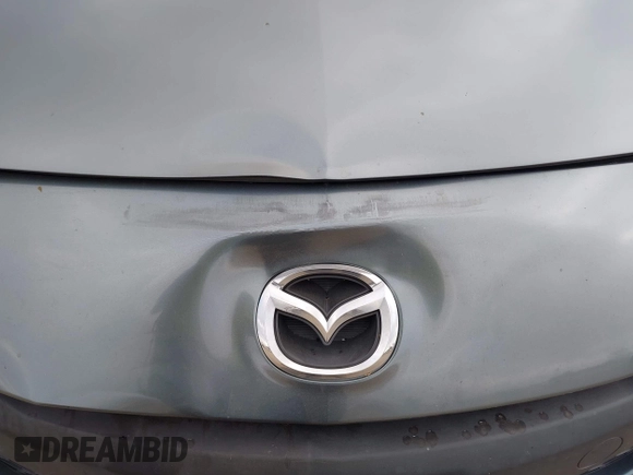 2012 Mazda Mazda3 i Touring with VIN JM1BL1L84C1671872, listed as a IAAI auction lot 42116842 with 85,343 mi miles. Bid and sale history available at carsss.com. Image 13.