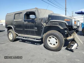 2004 Hummer H2 with VIN 5GRGN23U24H104327, listed as a Copart auction lot 74150914 with 181,933 mi miles and Salvage Title. Bid and sale history available at carsss.com. Image 4.