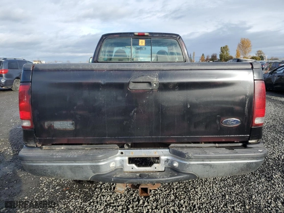 1999 Ford Super Duty F-250 XL with VIN 1FTNX21S7XED85129, listed as a Copart auction lot 80031894 with 176,769 mi miles and Salvage Title. Bid and sale history available at carsss.com. Image 6.
