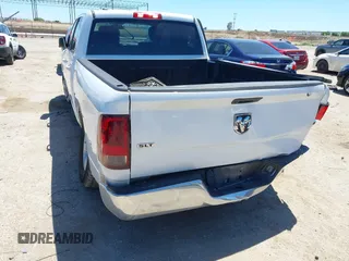 2021 Ram 1500 SLT with VIN 1C6RR6TTXMS517345, listed as a IAAI auction lot 42314123 with 107,307 mi miles and . Bid and sale history available at DreamBid. Image 3.