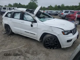 2022 Jeep Grand Cherokee Laredo X with VIN 1C4RJFAG1NC148232, listed as a Copart auction lot 60547065 with Not provided miles and Salvage title. Bid and sale history available at DreamBid. Image 4.